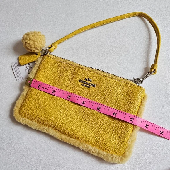 Vintage NWT Coach Shearling Small Wristlet in Banana Yellow With Pom Pom - Picture 15 of 16